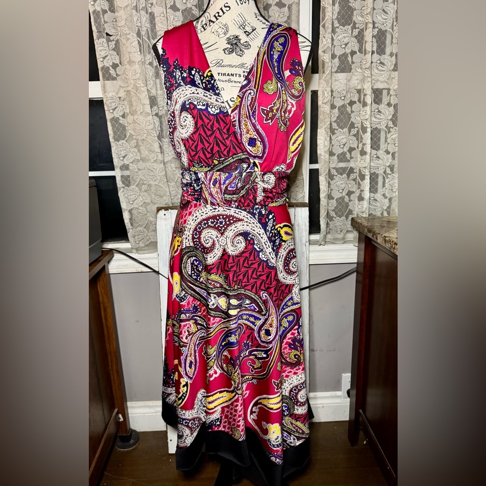 Funky, handkerchief hem, V neck midi dress.